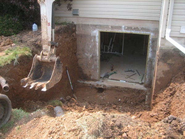 Crane digging space on basement