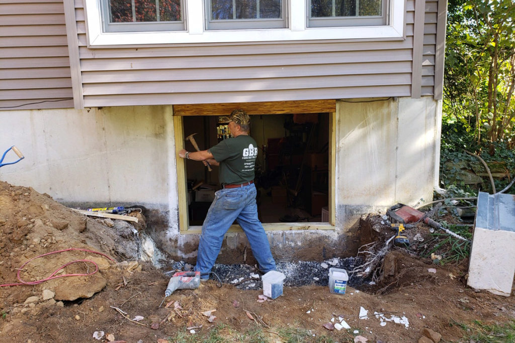 In process to install a 5 foot wide, egress compliant, slider window under a box bay window in WOODSTOCK LANE, WEST CHESTER, PA