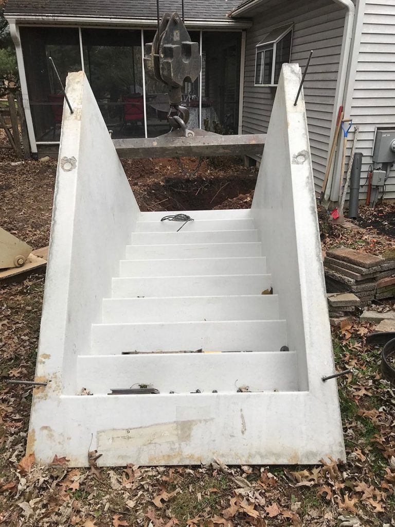 In process to remove those dangerous, worn out metal stairs and install new Permentry Precast Concrete stairs with a Bilco Door in BETHEL CHURCH ROAD – PARKERSFORD