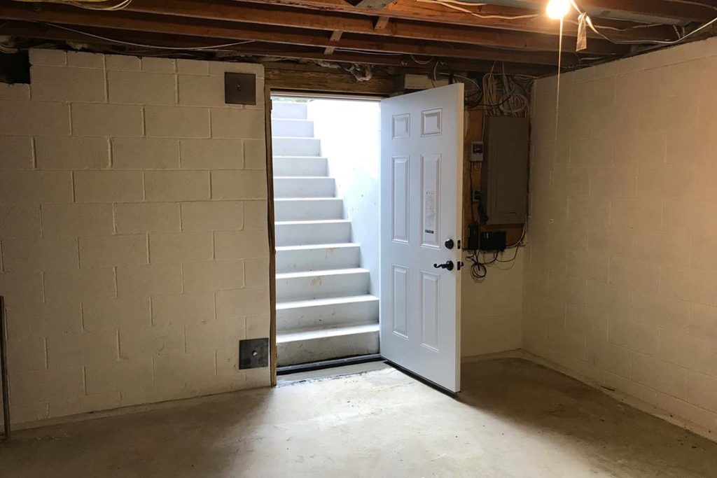 After installation of Size “E” Permentry Precast Stair with a Metal Bilco door and a six panel insulated door at the base of the stairs in MOORE ROAD, DOWNINGTOWN