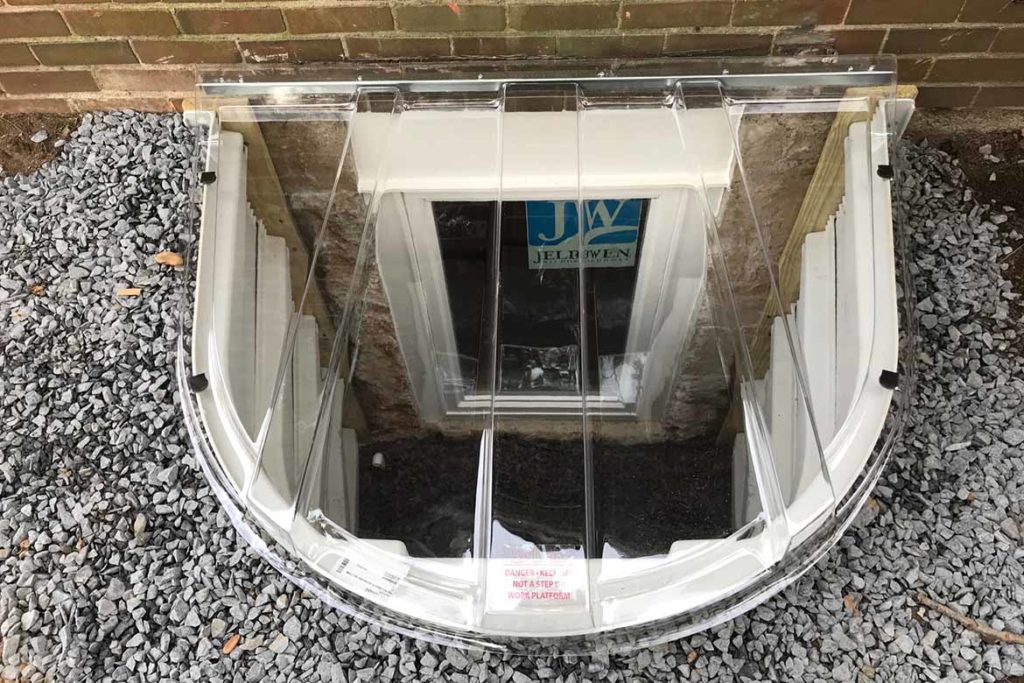 After installation of a Wellcraft model 5600 egress well, a Wellcraft polycarbonate cover and a JeldWen egress compliant casement window in FLORIDA AVENUE, WHITEHALL