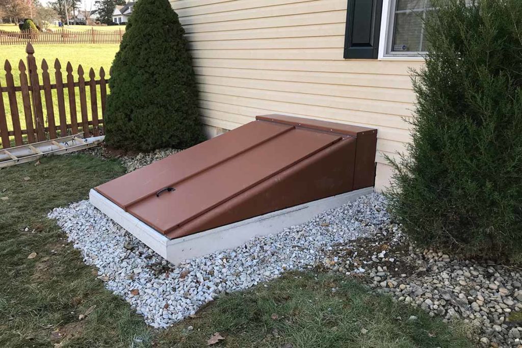 After installation of a Permentry precast concrete stair, with a Bilco door, and a 3/0 x 6/8 insulated six panel door at the base of the stair in KELLER WAY, DOWNINGTOWN