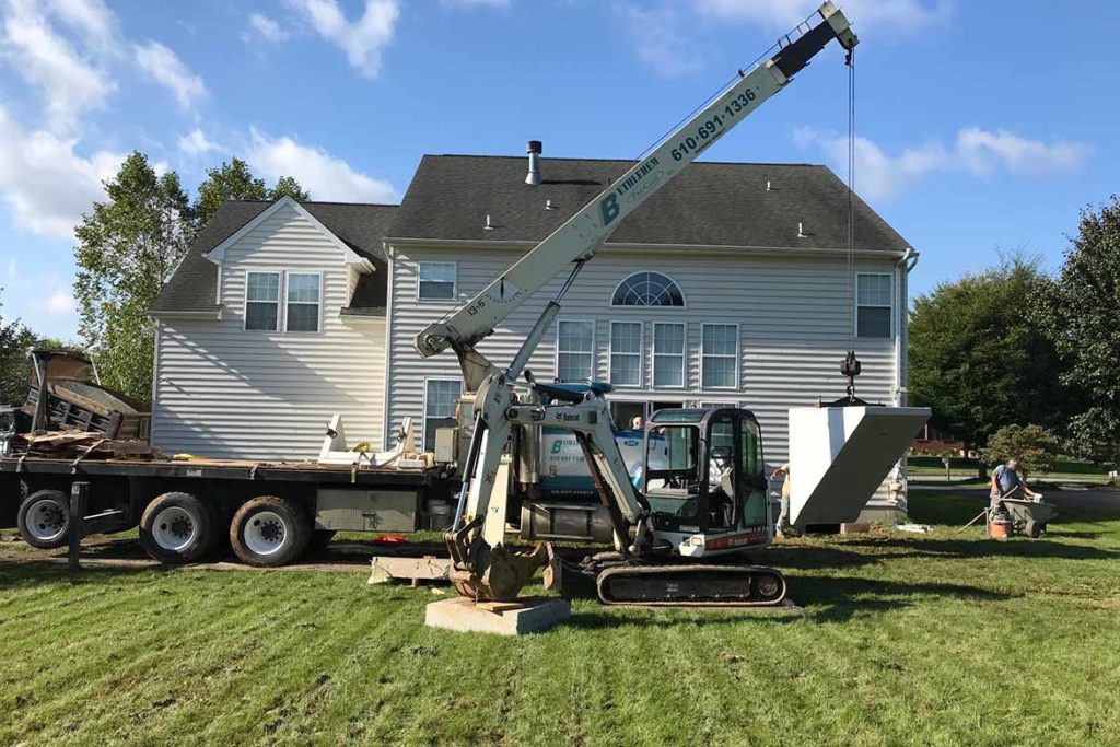 In process to install a Permentry precast concrete stair, with a Bilco door, and a 3/0 x 6/8 insulated six panel door at the base of the stair in WICK DRIVE, PARKESBURG