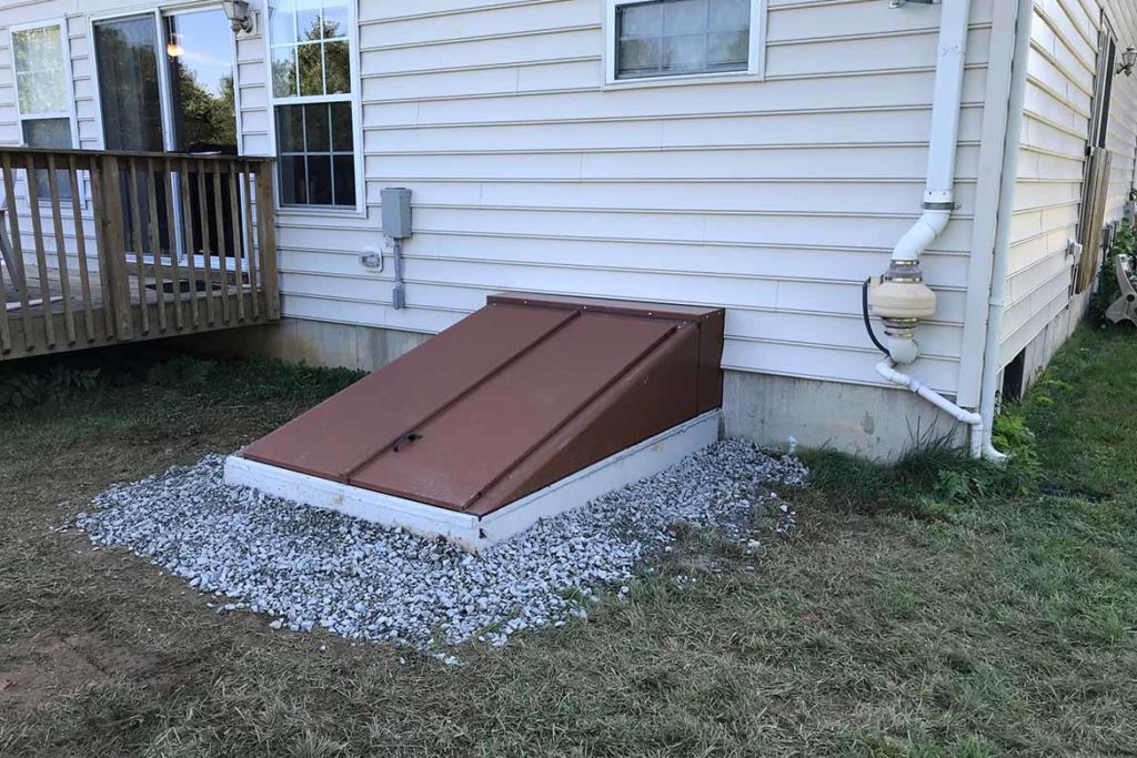 After installation of a Permentry precast concrete stair, with a Bilco door, and a 3/0 x 6/8 insulated six panel door at the base of the stair in WICK DRIVE, PARKESBURG