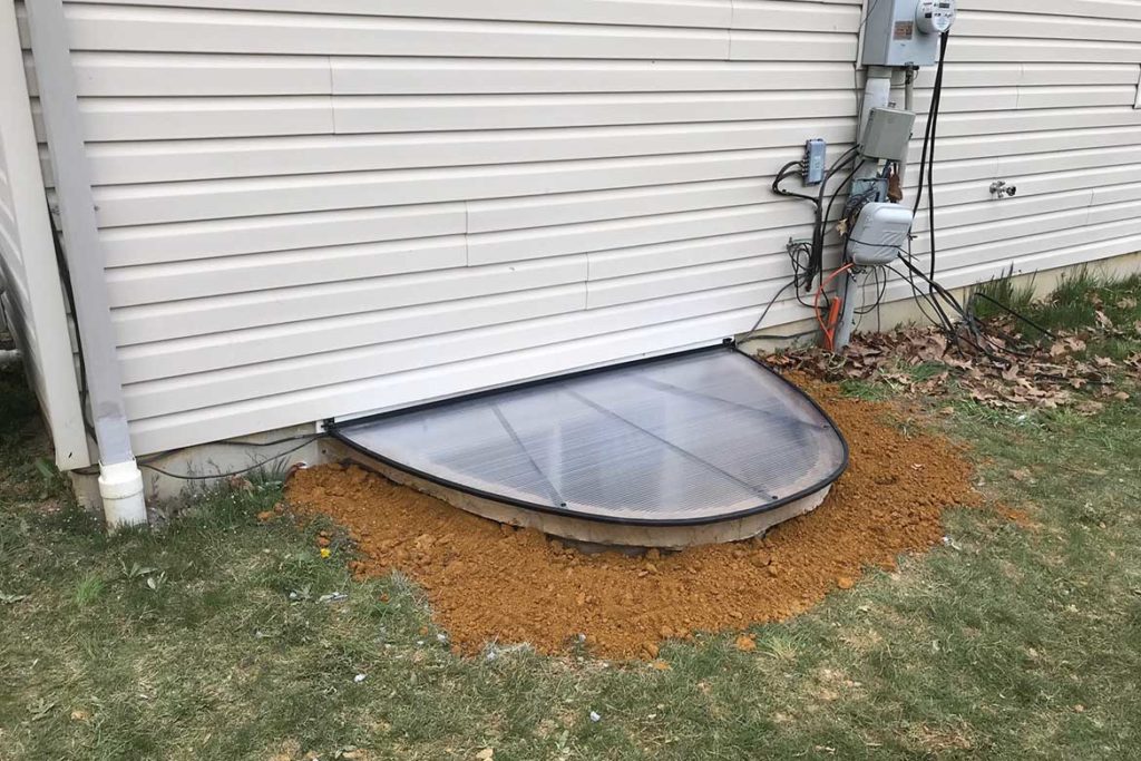 After installation of a Rockwell Elite egress well, a Rockwell polycarbonate cover, and a JeldWen egress compliant horizontal slider window in JENNIFER DRIVE, SINKING SPRING