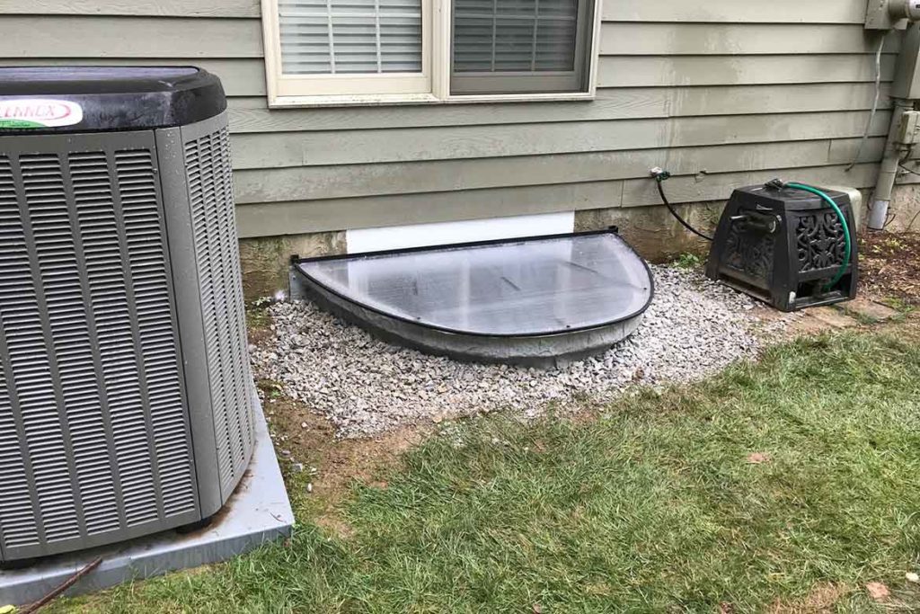 After installation of a Rockwell Elite egress well, a Rockwell polycarbonate cover, and a JeldWen egress compliant horizontal slider window in BARTON DRIVE, SPRING CITY